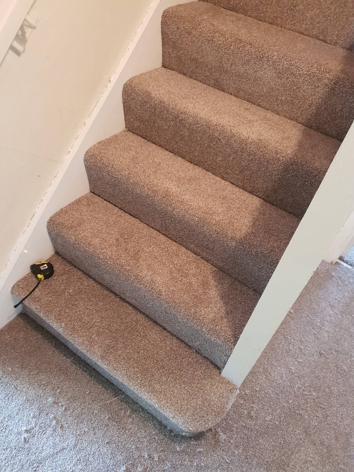 light carpet fitted on staircase and hallway