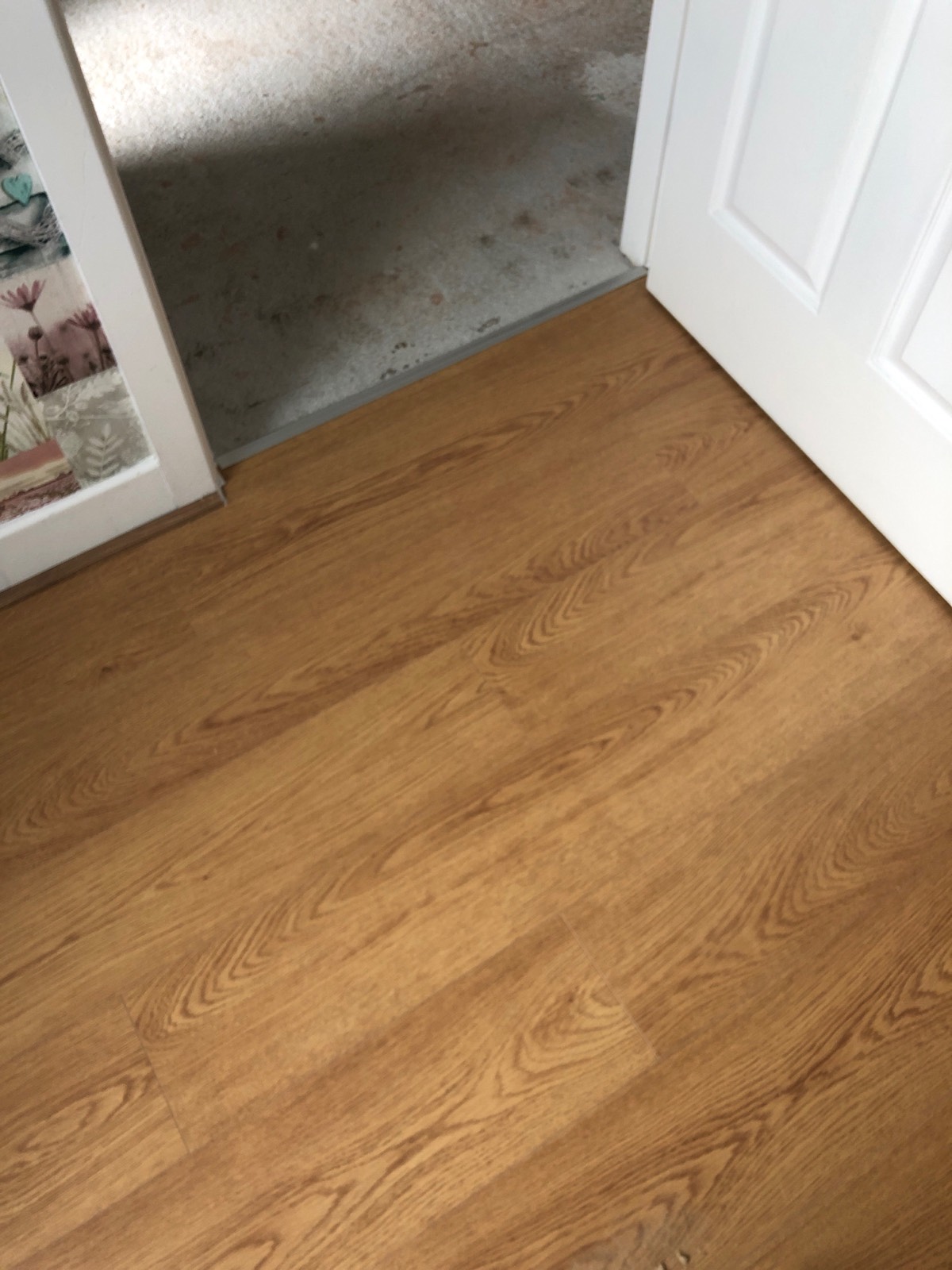 light brown wooden laminate fitting in living area