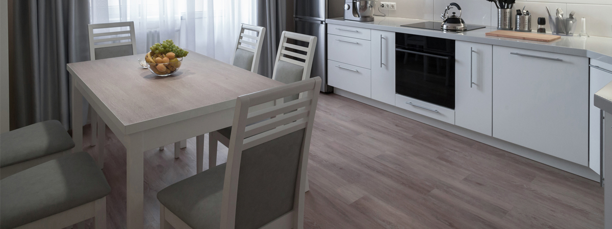 Image of kitchen, with dining table and laminate flooring